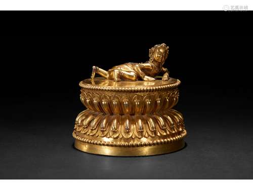 A GILT-BRONZE DOUBLE LOTUS STAND WITH FIGURE