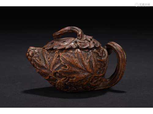 A BAMBOO ROOT CARVED TEAPOT