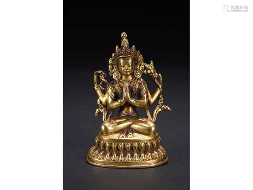 A GILT-BRONZE FIGURE OF SEATED BODHISATTVA