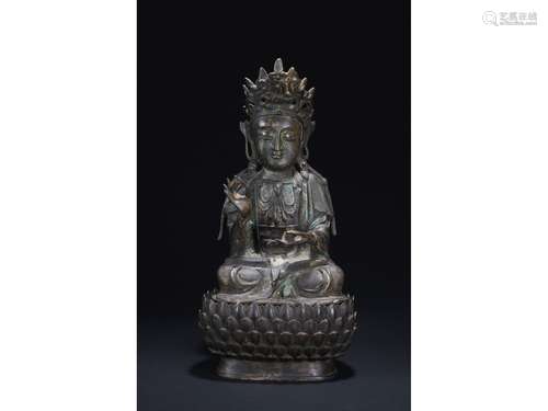 A BRONZE FIGURE OF GUANYIN