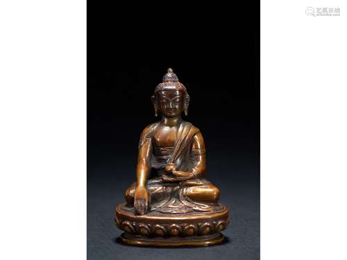 A SMALL BRONZE FIGURE OF SEATED SHAKYAMUNI