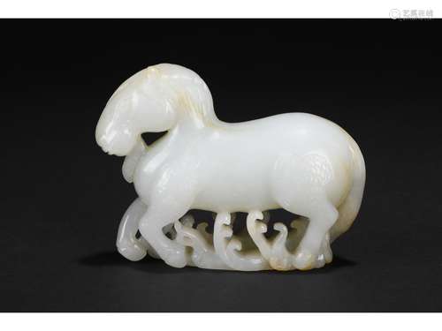 A WHITE JADE CARVING OF HORSE