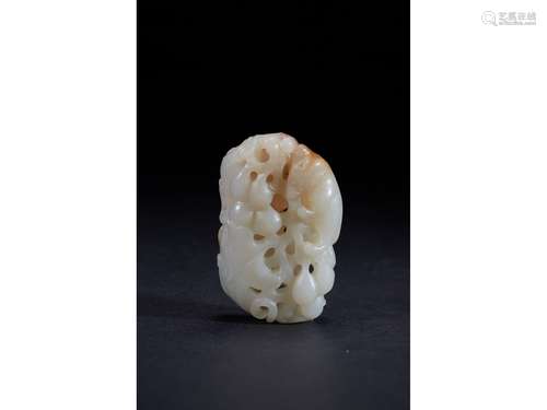 A WHITE JADE CARVING OF SQUIRREL AND GRAPES