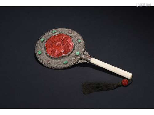 AN ANTIQUE CINNABAR LACQUER BONE HAND MIRROR