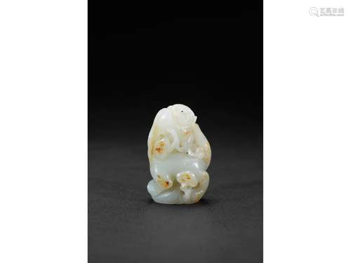 A SMALL WHITE JADE CARVING OF QILIN