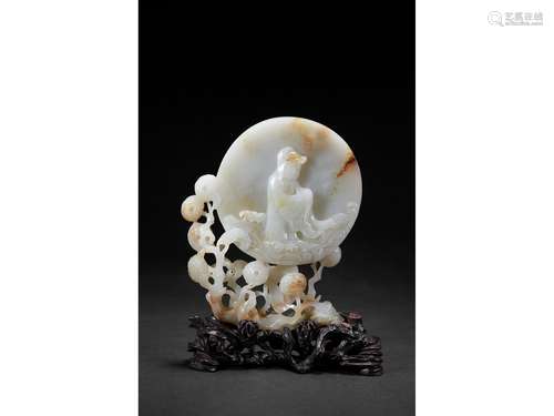 A SMALL WHITE JADE CIRCULAR 'GUANYIN' TABLE SCREEN