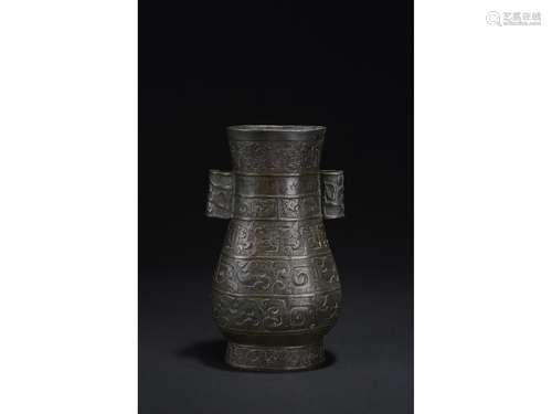 AN ARCHAISTIC BRONZE HU VESSEL