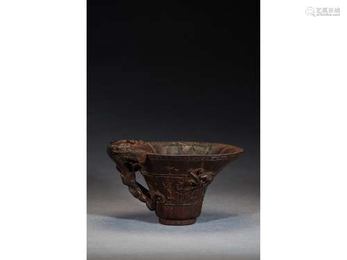 AN ALOESWOOD CARVED 'DRAGON' LIBATION CUP