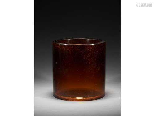 AN AMBER GLASS GOLD-SPLASHED BRUSHPOT