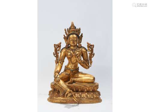 A GILT-BRONZE FIGURE OF TARA