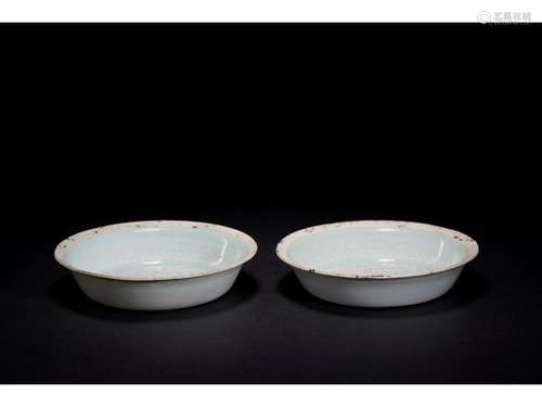 A PAIR OF CELADON GLAZED DISHES