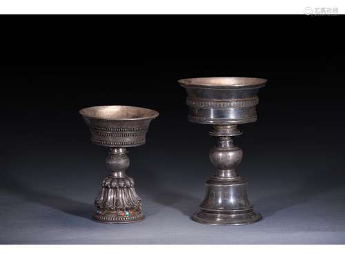 A GROUP OF TWO TIBETAN SILVER BUTTER LAMPS