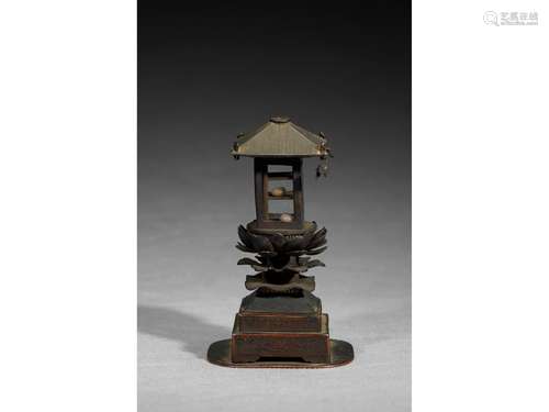 A BRONZE PAGODA MODEL CONTAINING TWO SARIRA BEADS