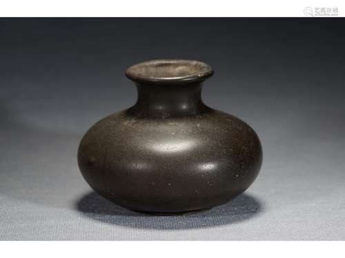 A BROWN GLAZED WATERPOT