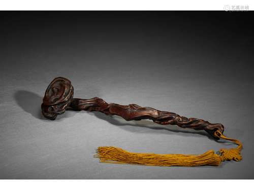 AN AGARWOOD CARVED RUYI SCEPTER