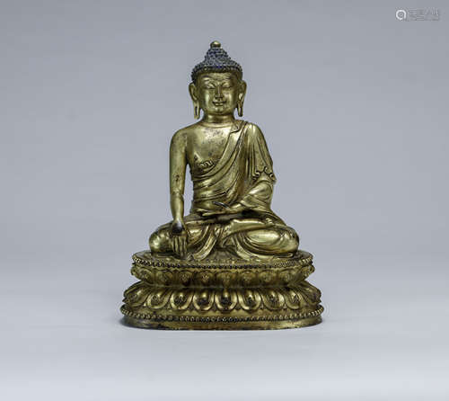 A Gilt-Bronze Figre Of Sakyamuni