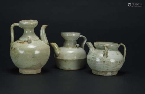 Song /Yuan-A Group Of Three Small White-Glazed Ewer<br>H:7.5 -12.5 cm. (3 - 4 7/8 in.)