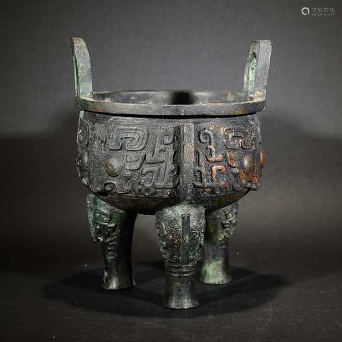 YUAN OR LATER, A TRIPOD BRONZE VESSEL WITH BEAST PATTERN