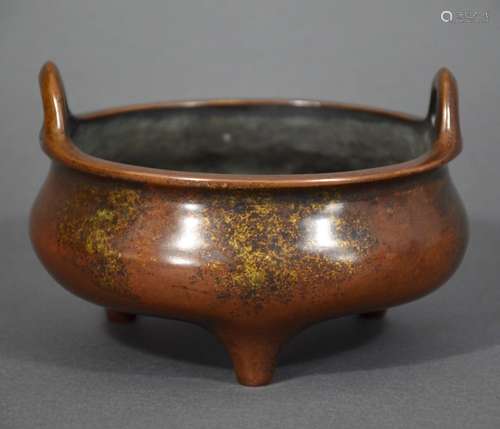 QING D., A TRIPOD BRONZE CENSER WITH TWO HANDLES