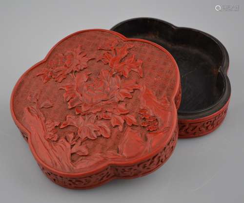 QIANLONG MARK, A CARVED RED LACQUER THUMB-RING BOX OF FLOWER PATTERN