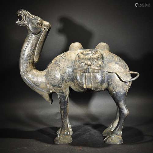 TANG OR LATER, A CARVED SILVER CAMEL