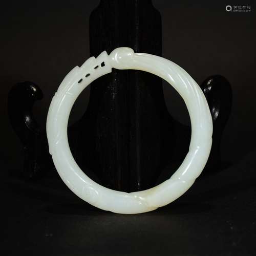 QING D., A HETIAN WHITE JADE DRAGON SHAPE BANGLE