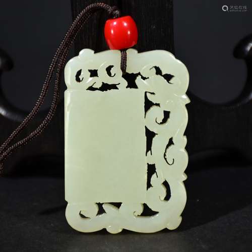 QING D., A CARVED HETIAN JADE OF DRAGON