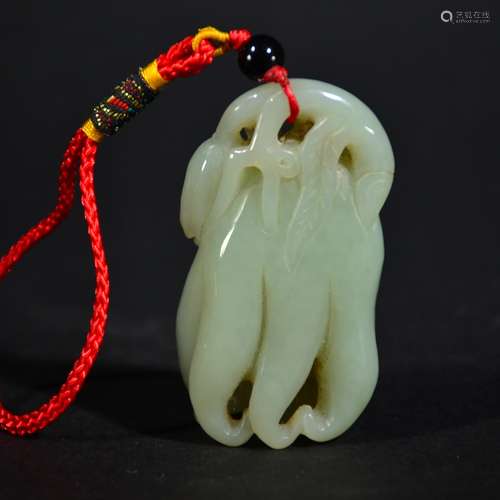 QING D., A CARVED JADE PENDANT