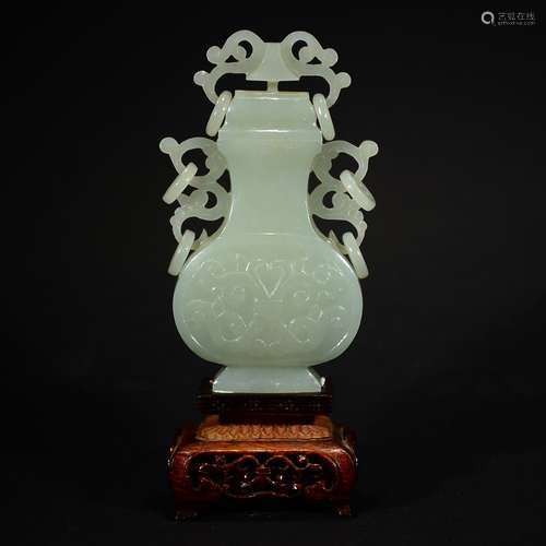 QING D., A LIGHT GREEN JADE BOTTLE WITH FOUR LOOP