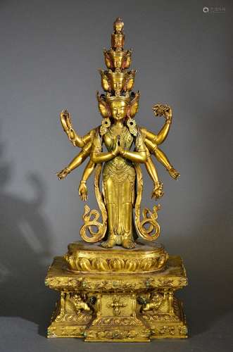 QING D., A GILT BRONZE GUANYIN FIGURE