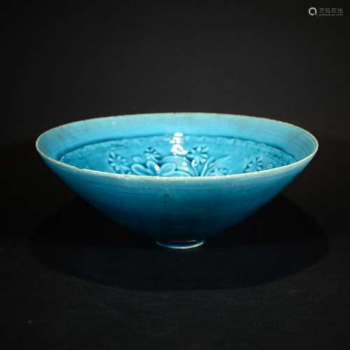 A CARVED GREEN DING WARE BOWL