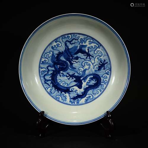 CHENGHUA MARK, A BLUE AND WHITE DISH WITH WAVE AND DRAGON PATTERN