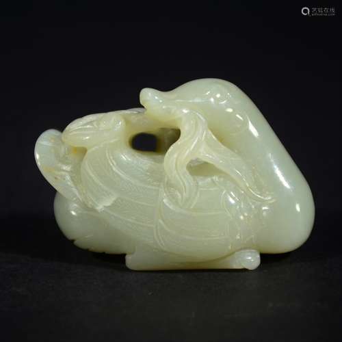 QING D., A CARVED HETIAN JADE ORNAMENT