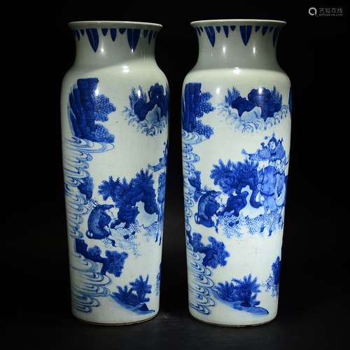 A PAIR OF BLUE AND WHITE FIGURAL VASES