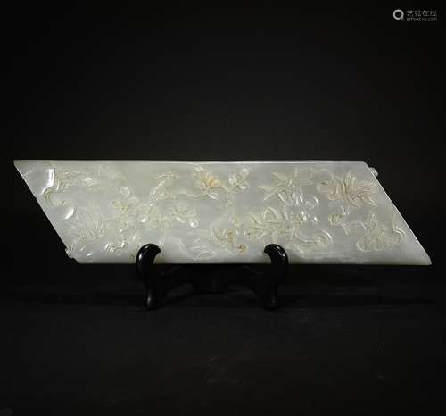 QING D., A WHITE JADE CARVING FLORAL ARM HOLDER