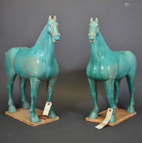 QING OR LATER, A PAIR OF GREEN GLAZED POCELAIN HORSES