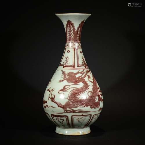 A UNDERGLAZED RED VASE WITH DRAGON PATTERN