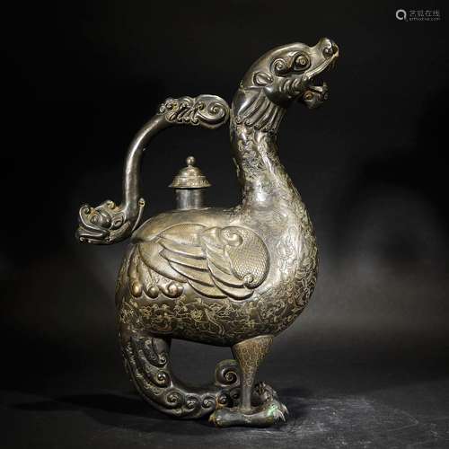 A CARVED PHEONIX WINE POT