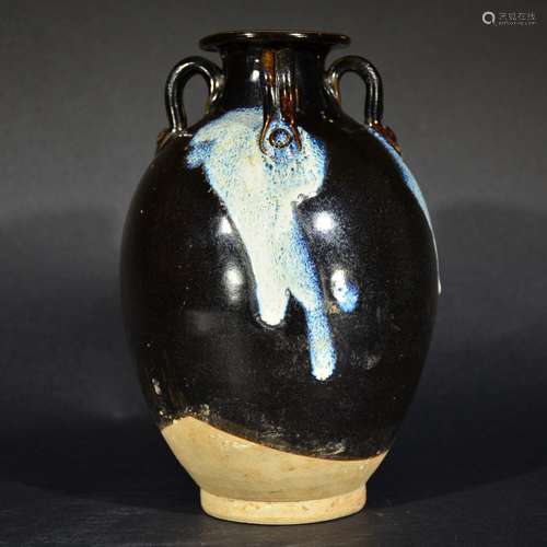 A BLACK GLAZED JAR