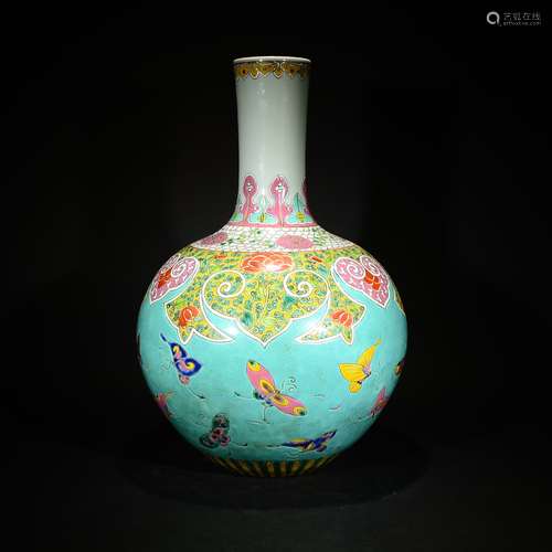 QING D., A GREEN GLAZED BUTTERFLY PATTERN VASE