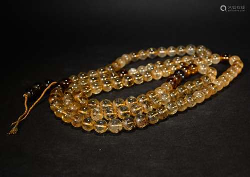 A CRYSTAL BUDDHA BEADS NECKLACE