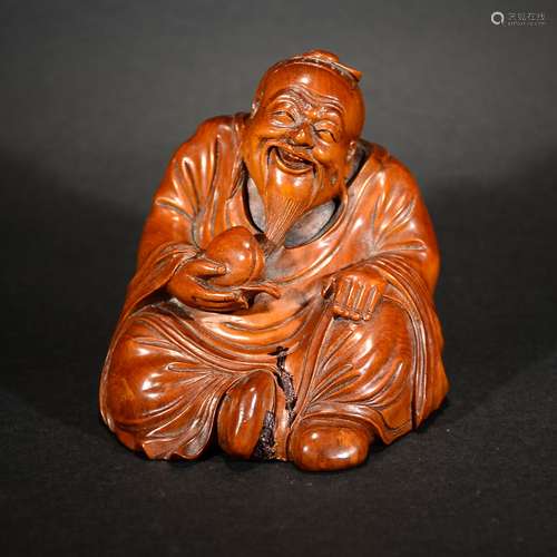 REPUBLIC PERIOD, A CARVED HUANGYANG WOOD FIGURE ORNAMENT OF THE GOD OF THE LONGEVITY