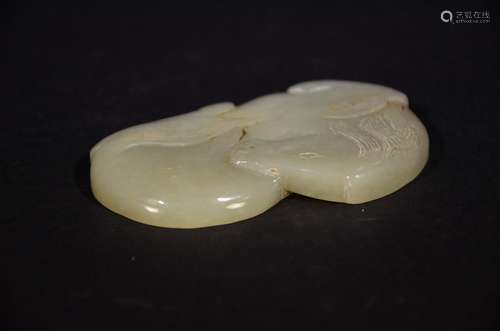 MING D., A CARVED HETIAN JADE PENDANT OF HORSE