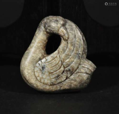 AN ANCIENT WHITE JADE GOOSE ORNAMENT