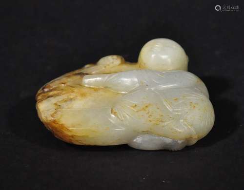 MING D., A CARVED WHITE JADE ORNAMENT OF CHILD