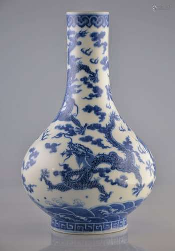 QING D., A BLUE AND WHITE  DRAGON VASE