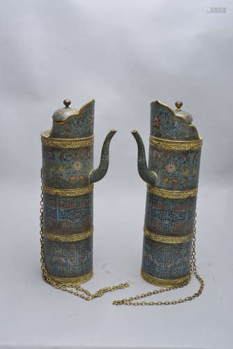 A PAIR OF CLOISONNE ENAMEL TIBETAN-STYLE EWERS