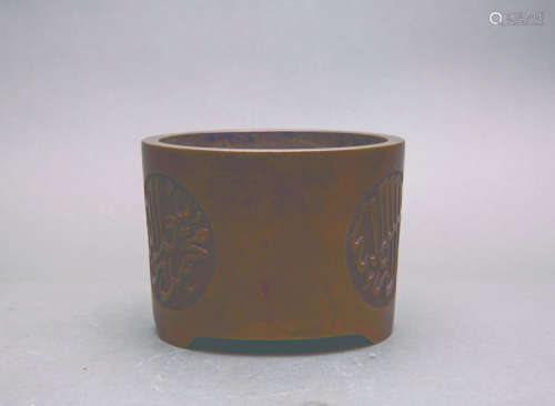 A BRONZE CENSER OF CYLINDRICAL FORM