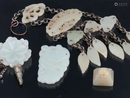 Group of Carved White and Celdon Jade Pendants