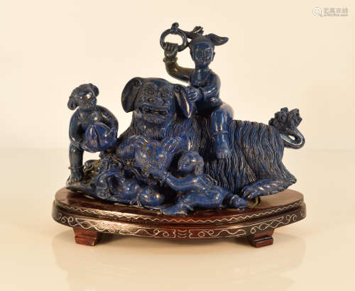 Chinese Lapis Carving of Boy Riding Foolion